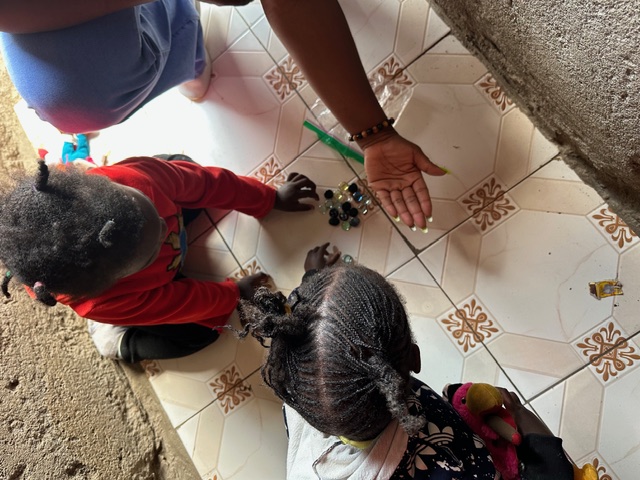 Children playing with beads